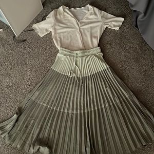 Pleated green tie skirt